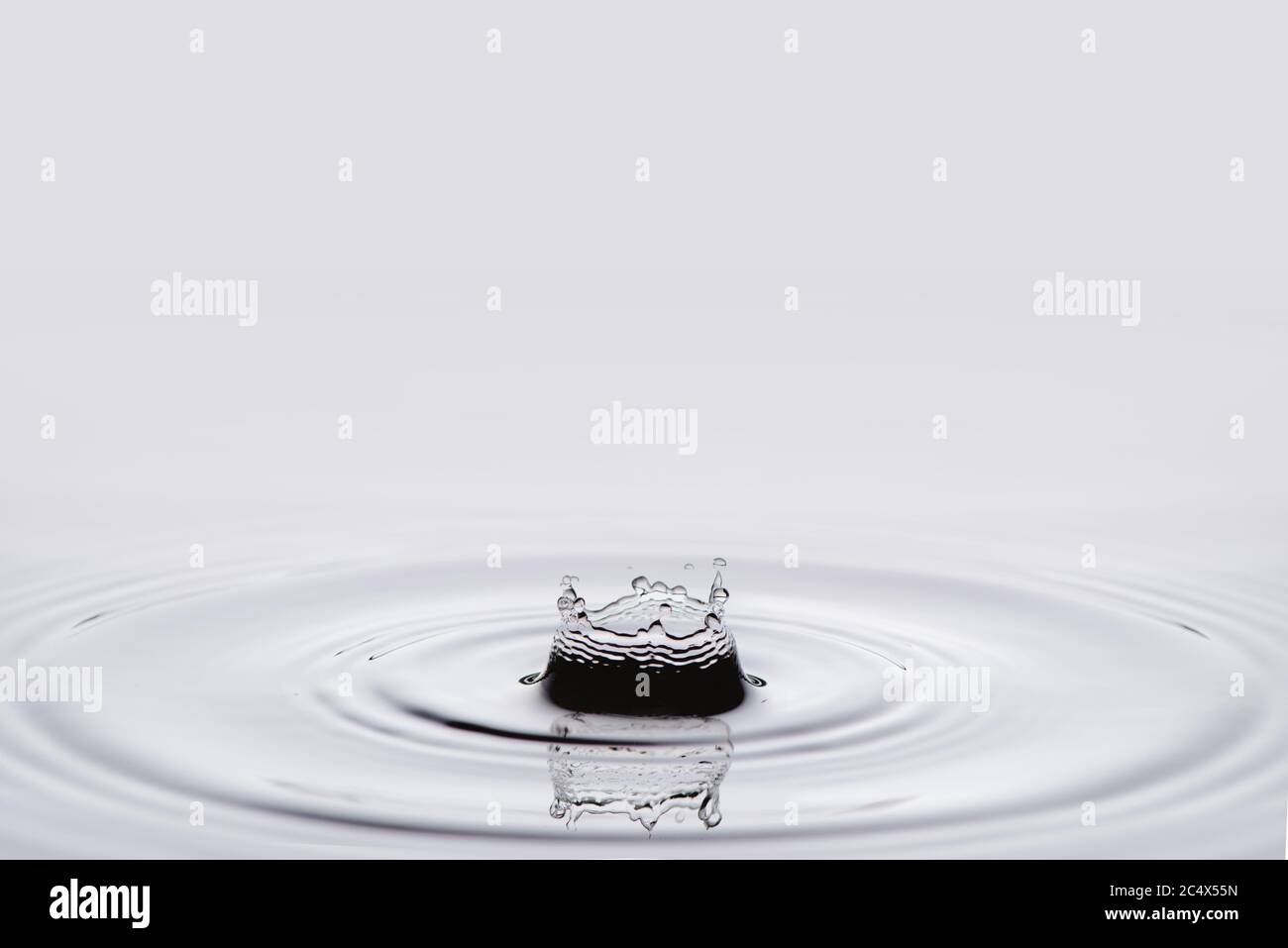 Water splash isolated on white background. Stock Photo