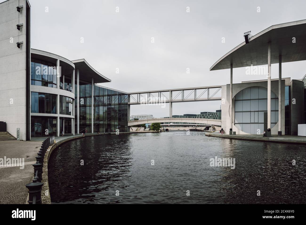 Urban scene with Spree river passing between Paul-Lobe-Haus building and Marie-Elisabeth-Luders-Haus building in Berlin, Germany Stock Photo