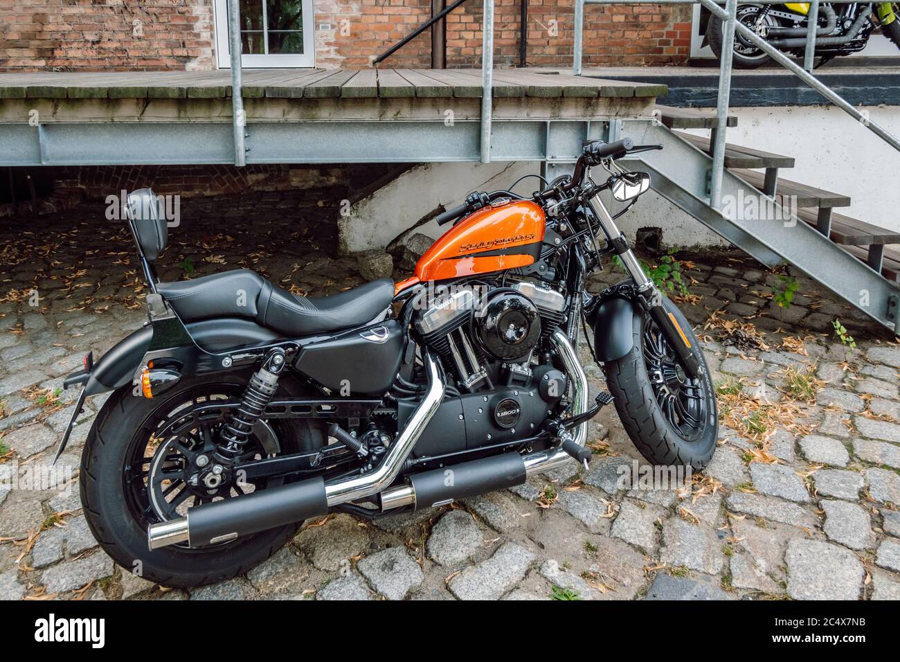 View of an orange classic Harley-Davidson Sportster 1200 Roadster motorcycle  Stock Photo - Alamy