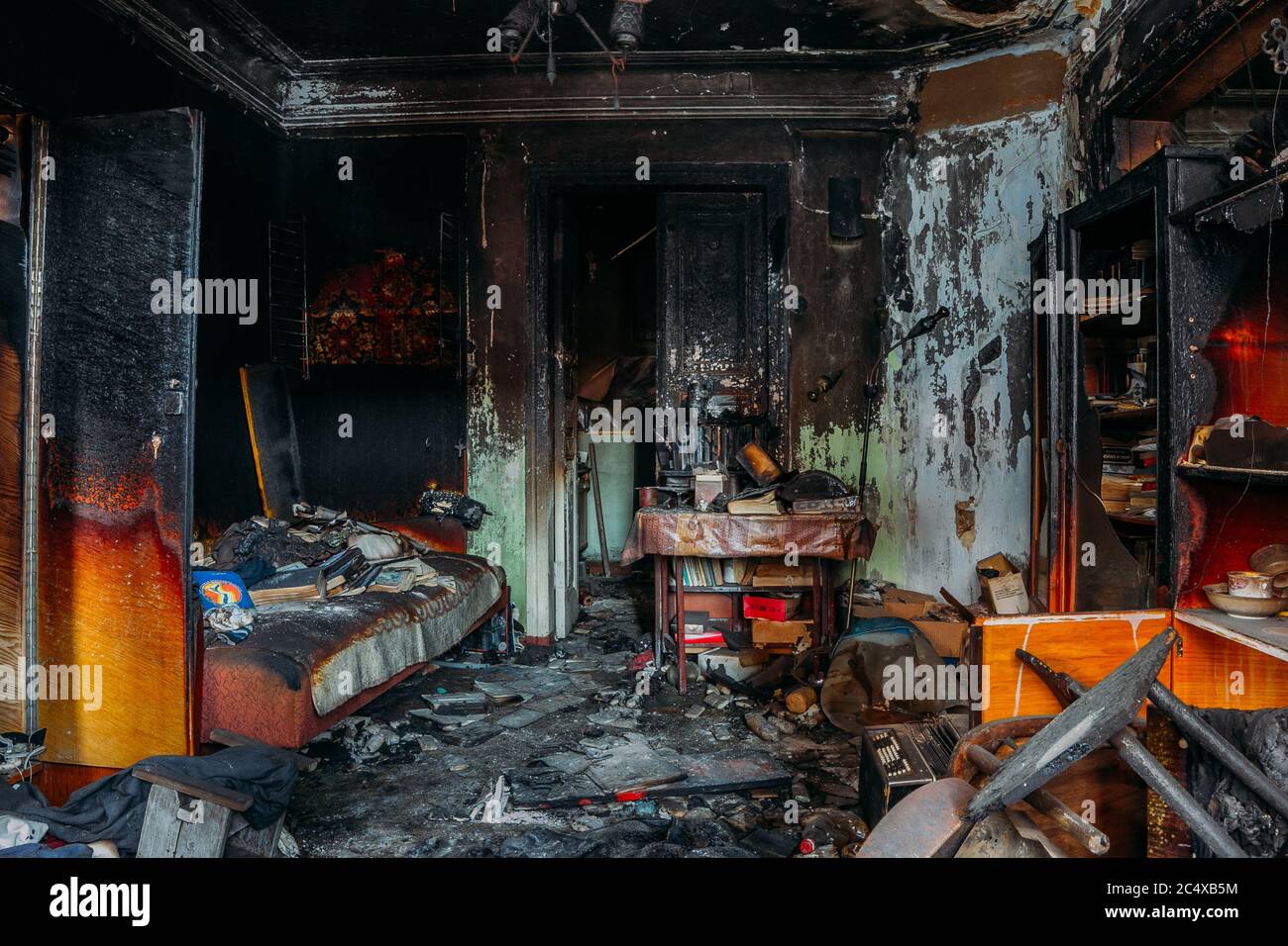 Burnt apartment house interior. Burned furniture. Consequences of fire