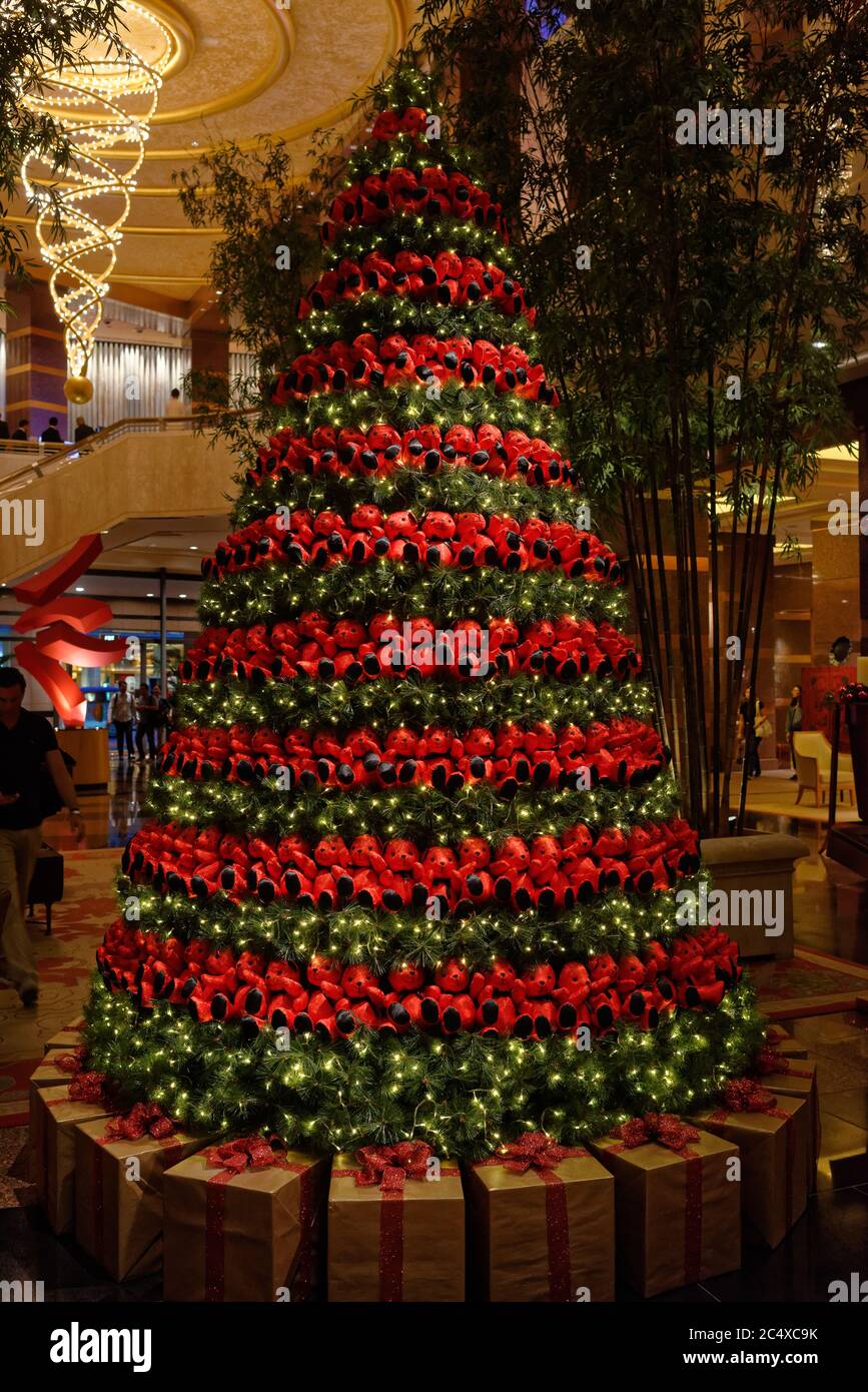 Red teddy bears in rows on the Conrad hotel Christmas Tree in Singapore Stock Photo