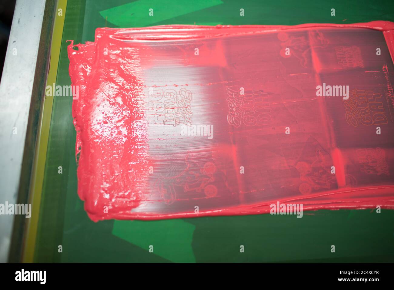 Silk screen printing. Serigraphy. Color paints and fabric. Plastisol