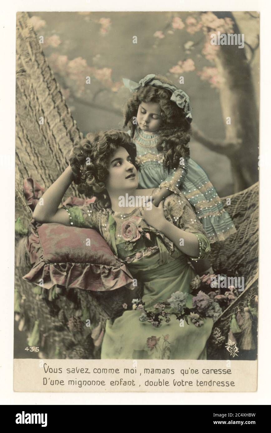 Early 1900's French sentimental tinted greetings card - mother and cute daughter, France, circa 1911 Stock Photo