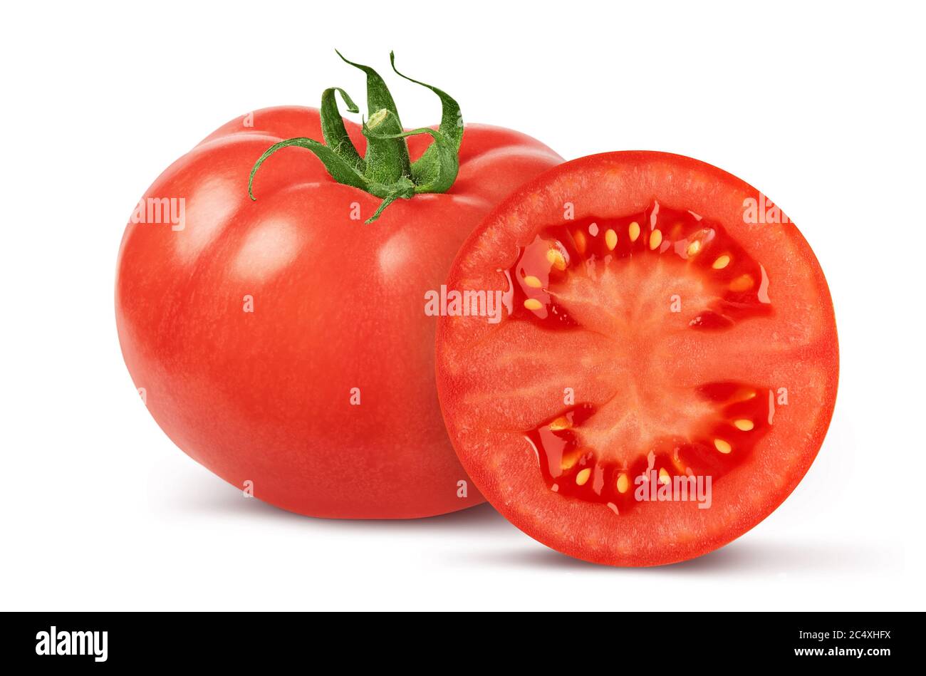 One whole tomato and slice isolated on white background with clipping path Stock Photo