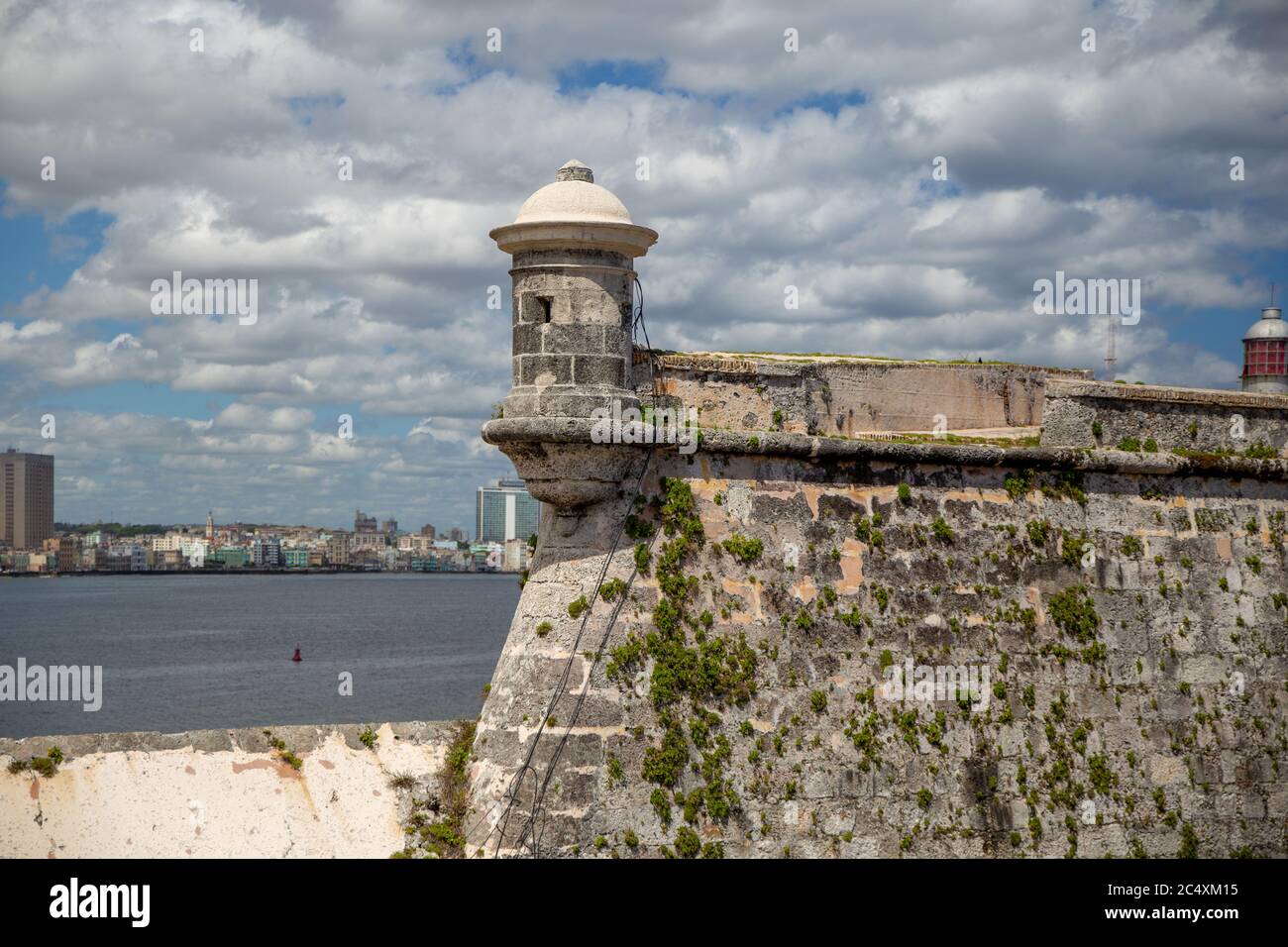 HAVANA, CUBA - CIRCA 2017: view of Havana city from Castillo de los Tres Reyes del Morro with beautiful cloudy sky. Travel and vacation must see. Old Stock Photo