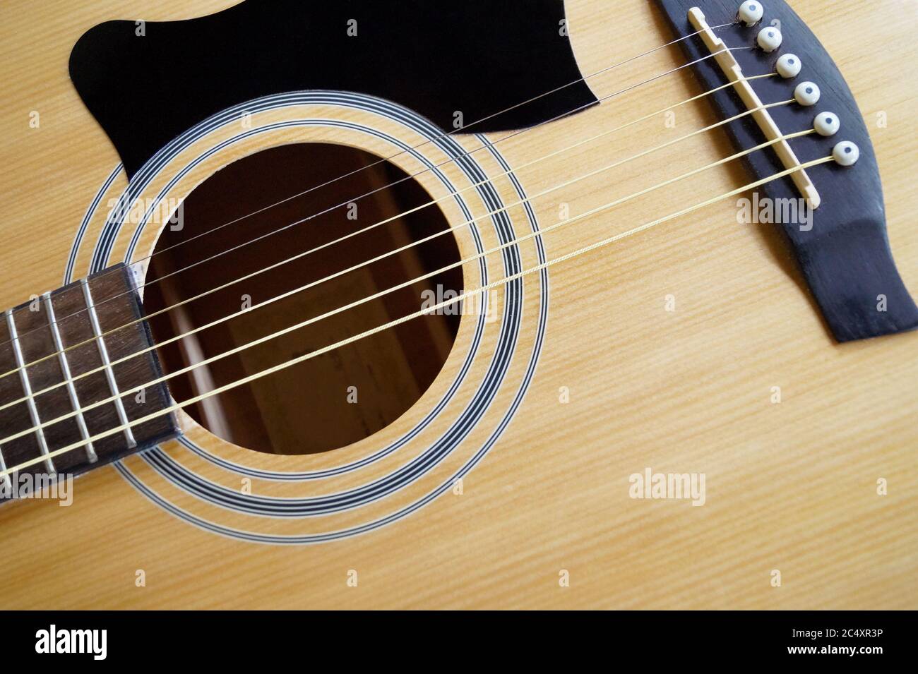 Man playing acoustic guitar Stock Photo