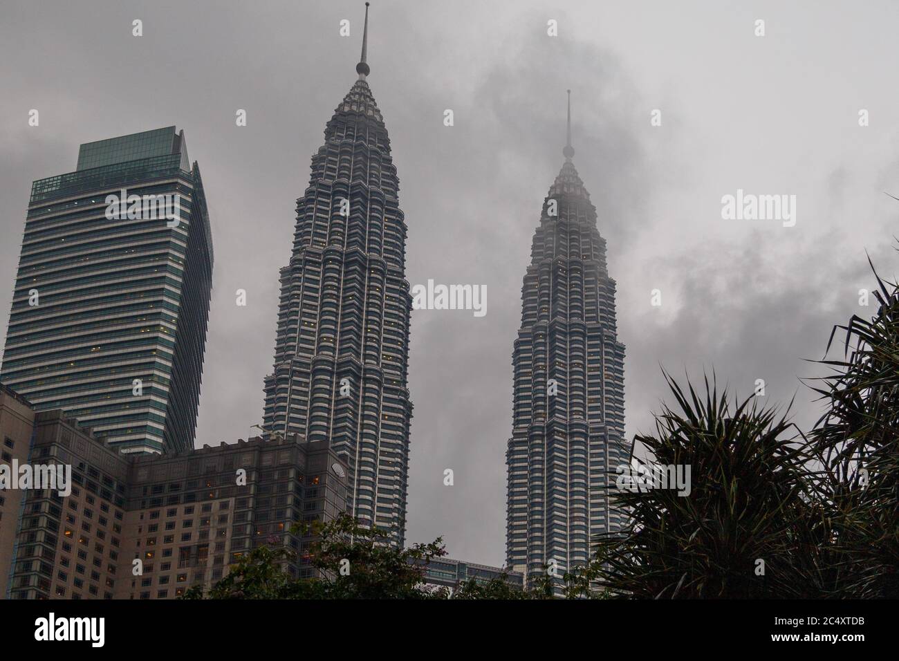 Kuala Lumpur, Malaysia - CIRCA 2017: view of KLCC or Petronas Towers, also known as the Petronas Twin Towers are twin skyscrapers in Kuala Lumpur. Stock Photo