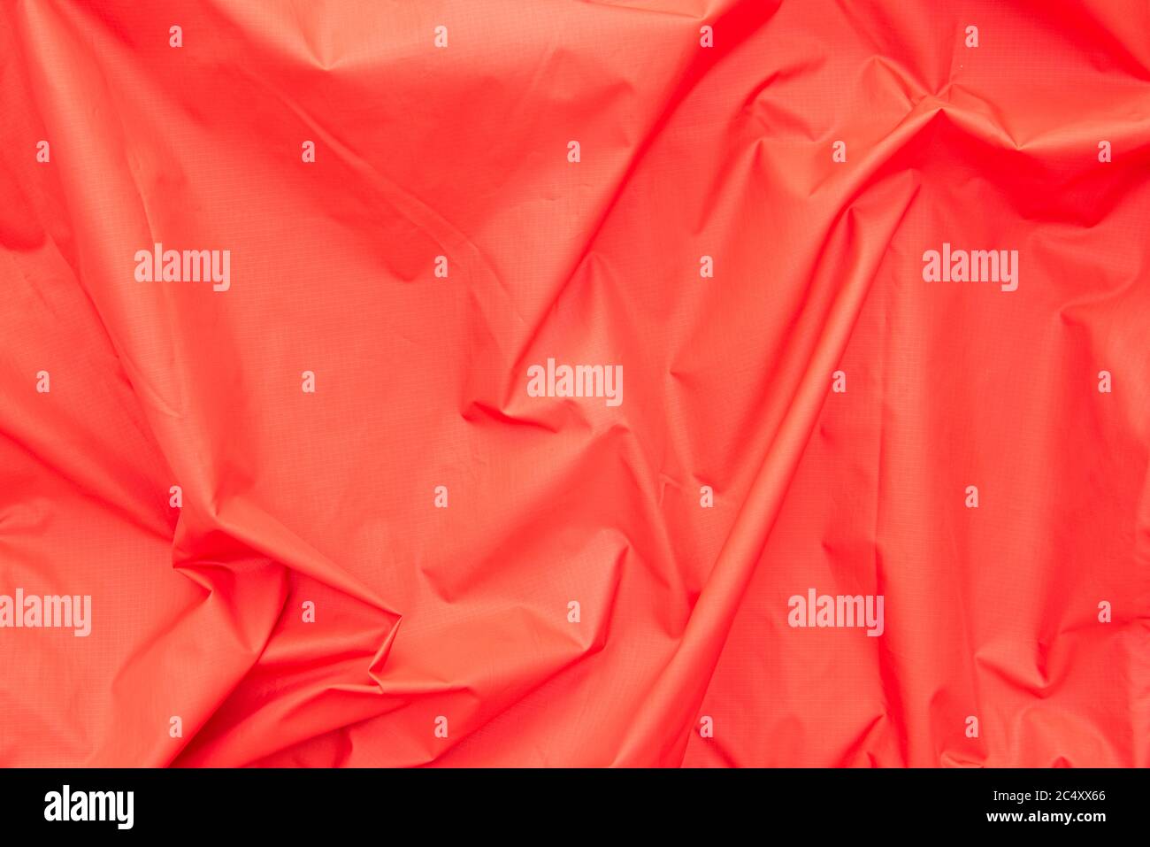 Red polyester or satin fabric, abstract background or texture Stock Photo