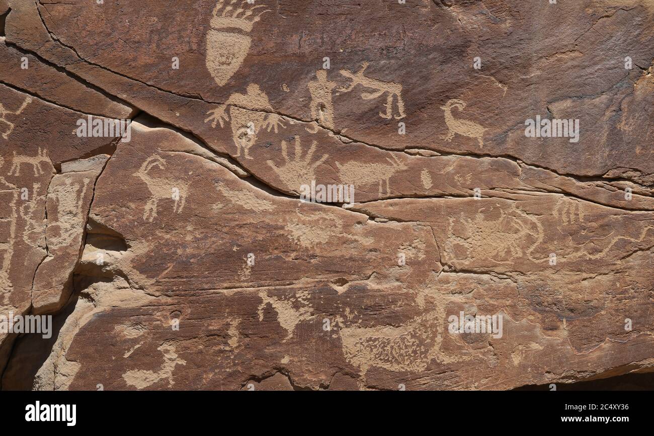 Ancient Native American Indian rock art petroglyph bear paw Utah panorama. Nine Mile Canyon, Utah. World’s longest art gallery ancient native America Stock Photo
