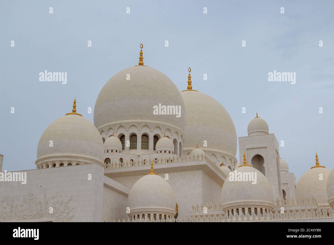 Abu Dhabi, UAE - CIRCA 2020:Sheikh Zayed Grand Mosque in Abu Dhabi, exterior view during the sunset located at the capital city of United Arab Emirate Stock Photo