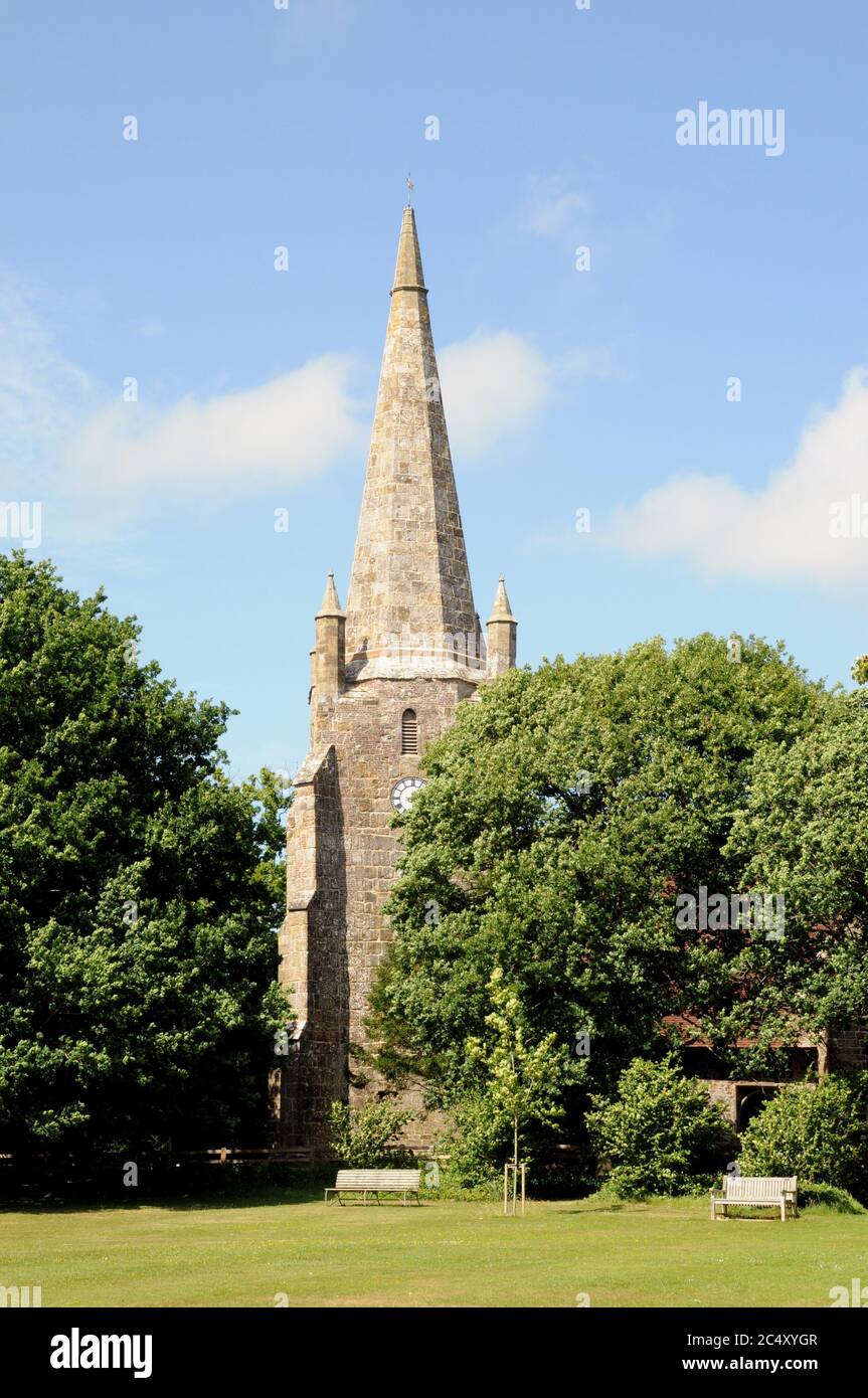 The 130 feet high stone spire of Chiddingly Church is one of only three in the county of East Sussex.The church is built of local sandstone. Stock Photo