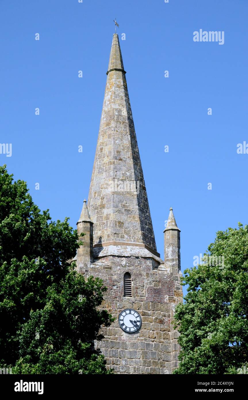 The 130 feet high stone spire of Chiddingly Church is one of only three in the county of East Sussex.The church is built of local sandstone. Stock Photo