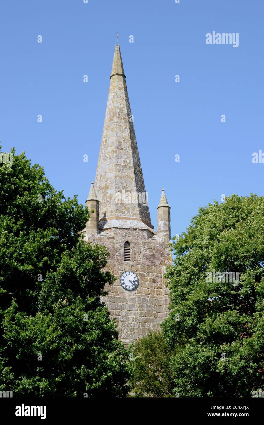 The 130 feet high stone spire of Chiddingly Church is one of only three in the county of East Sussex.The church is built of local sandstone. Stock Photo