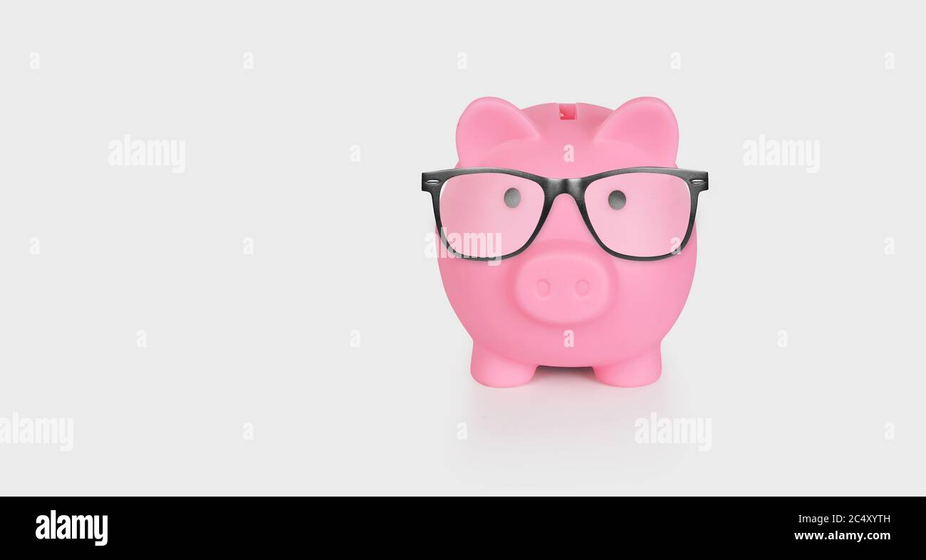 Pink piggy bank with glasses isolated on a white background Stock Photo ...