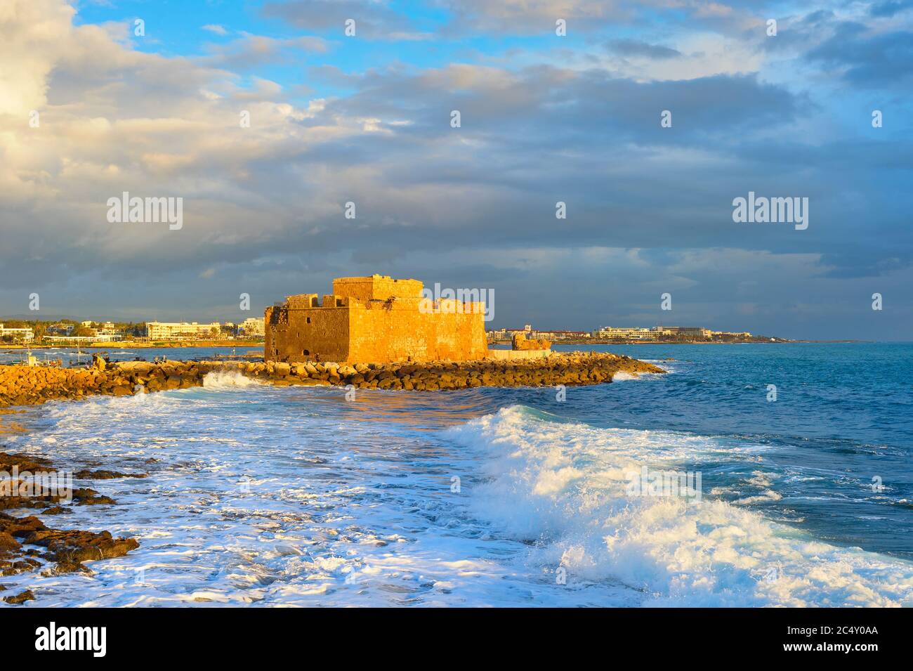 Scenic sunset seascape with clouds and Paphos Harbour Castle view ...