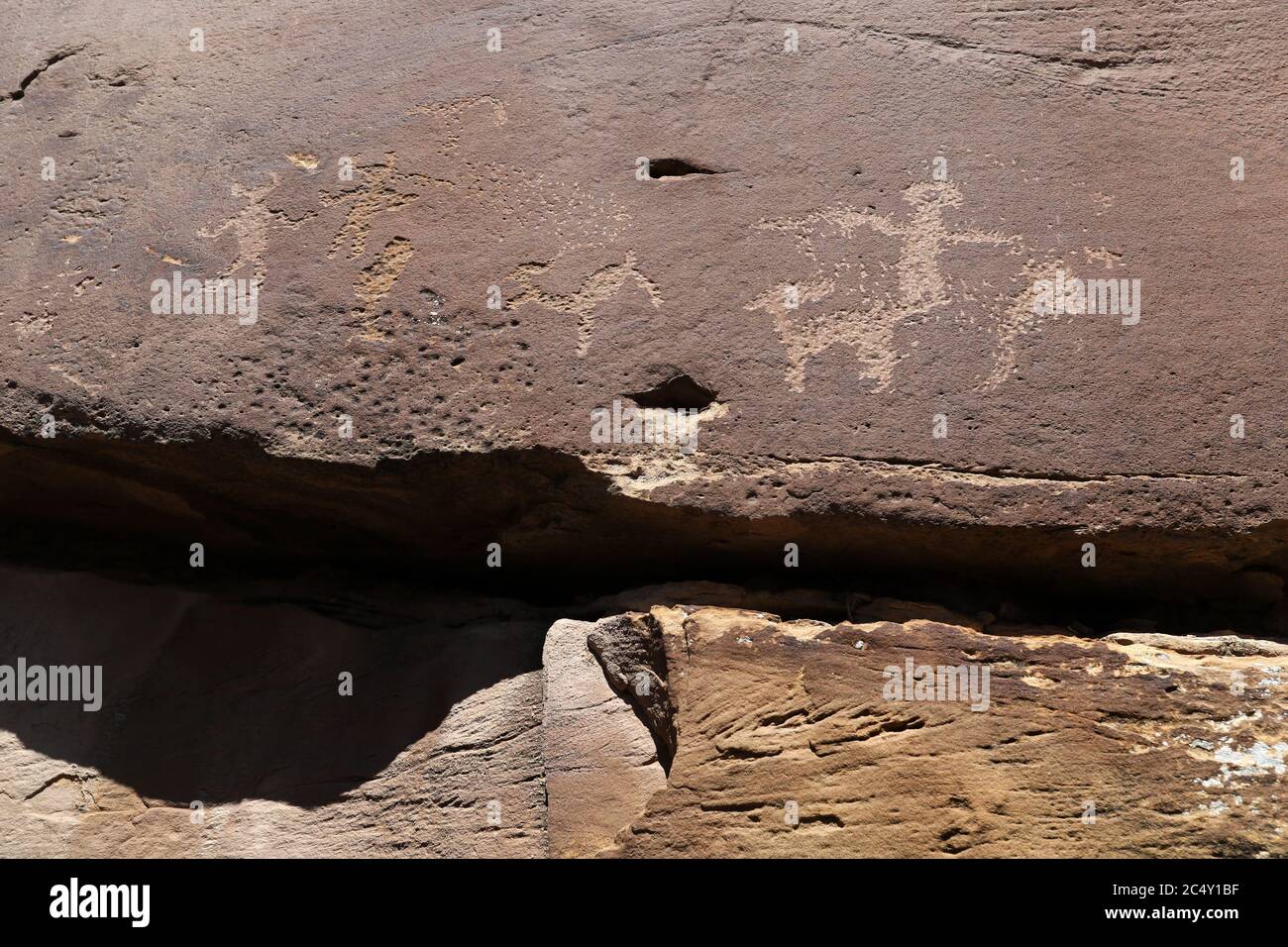 Native American Indian rock petroglyph sheep hunters Utah 1392. Nine Mile Canyon, Utah. World’s longest art gallery of ancient native America. Stock Photo