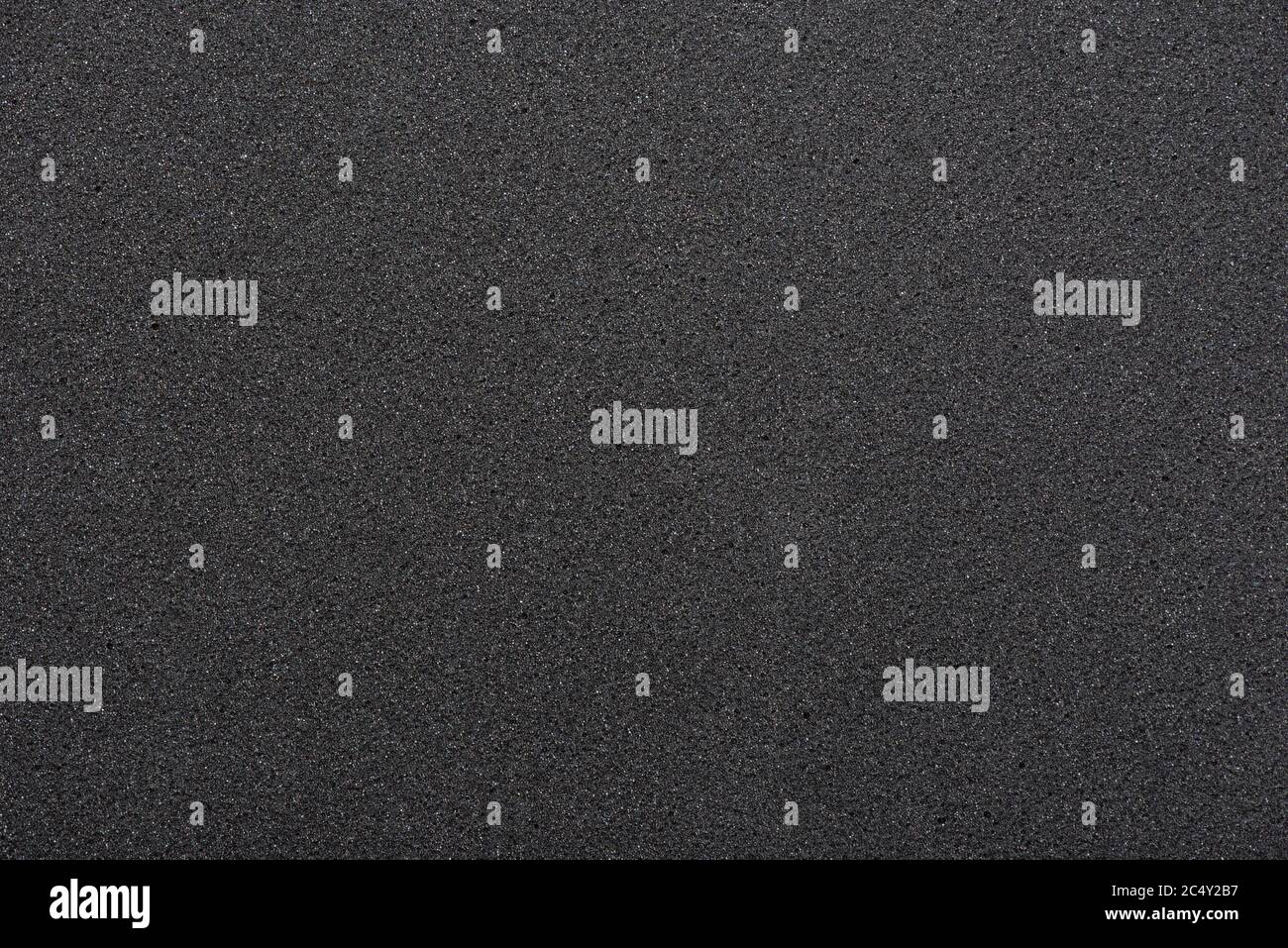 Black sponge texture. foam rubber background. Stock Photo
