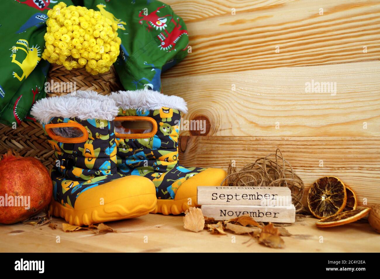 Winter fall baby boy clothes and boots Stock Photo - Alamy
