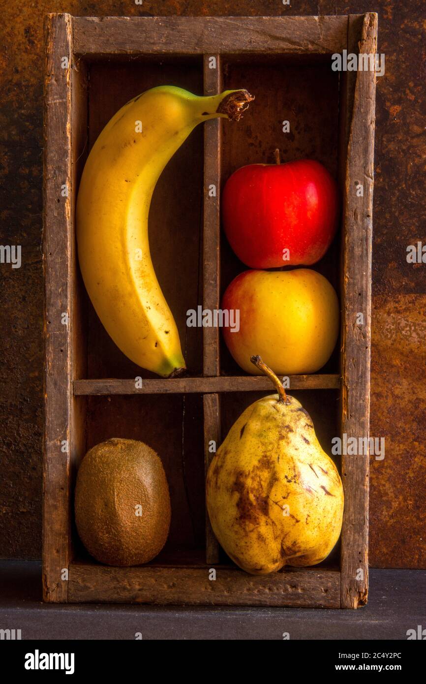 Variety of fruits in a wooden box Stock Photo - Alamy