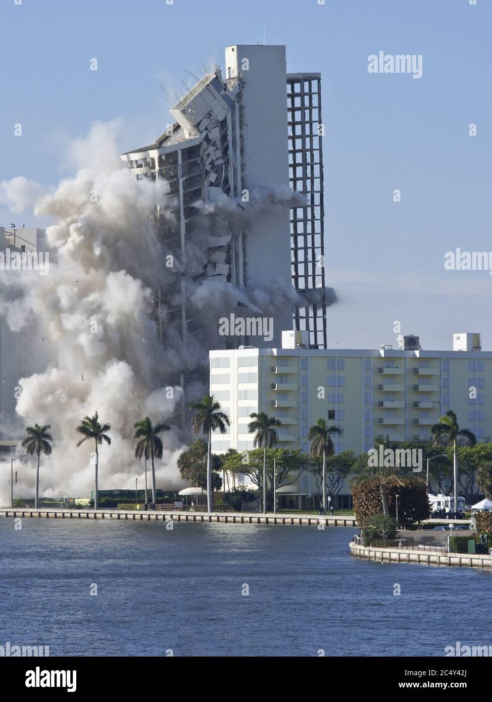apartment building demolition using blast of dynamite Stock Photo - Alamy