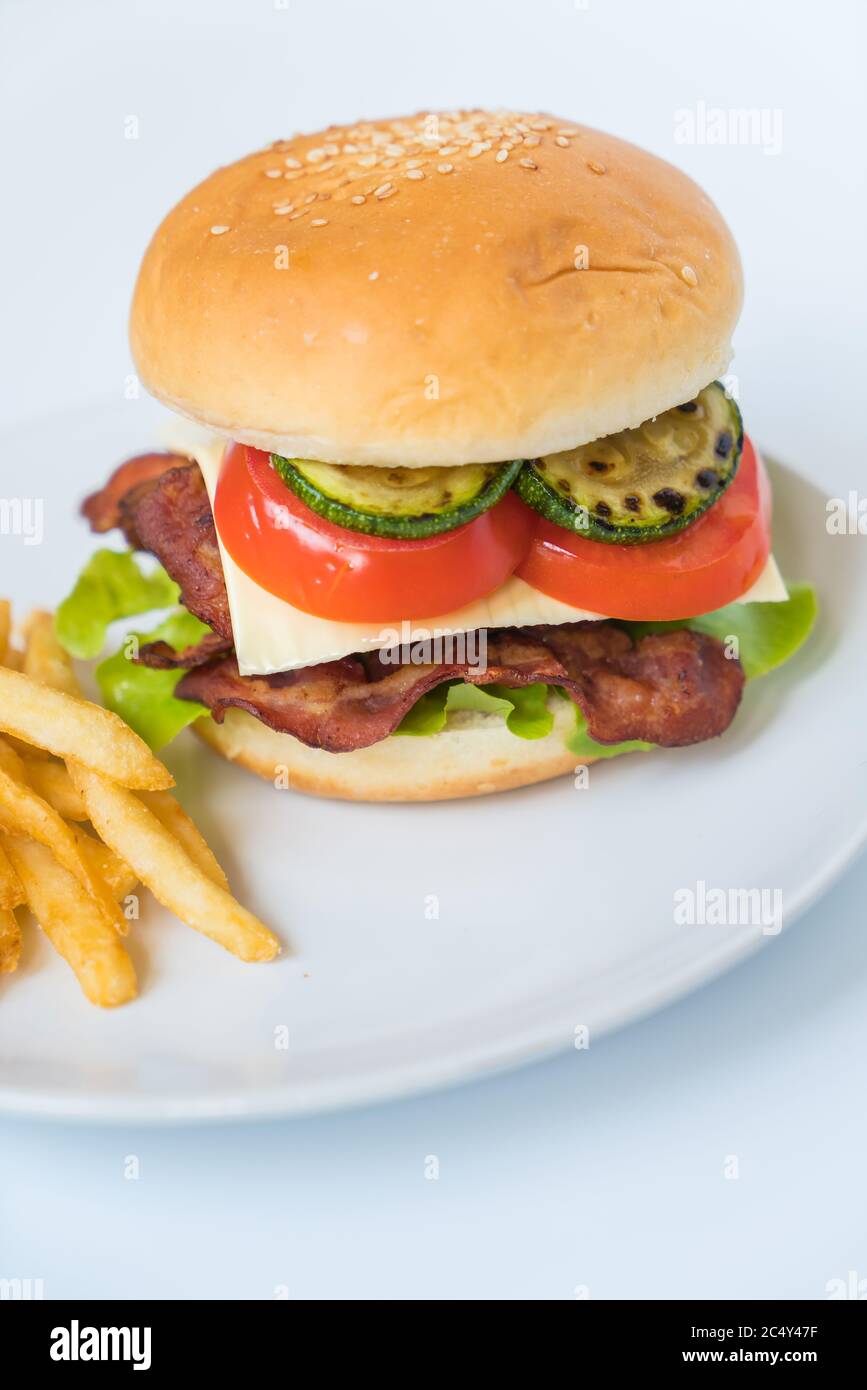 bacon burger with french fries Stock Photo Alamy