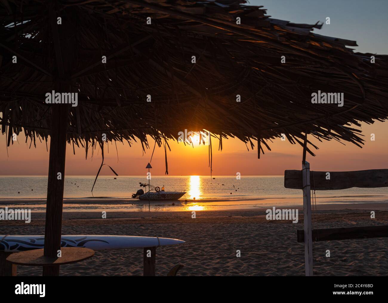 Beautiful sunset on beach boats hi-res stock photography and images - Alamy