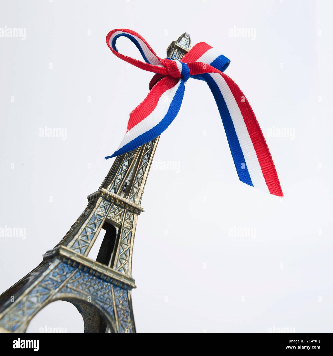 Replica eiffel tower with a ribbon in the colors of France Stock Photo ...