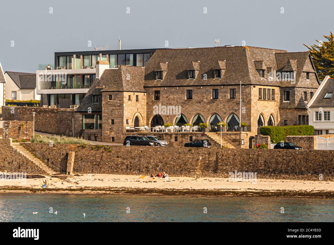 The Relais & Chateaux Hotel Brittany & Spa is located on the promenade with a small sandy beach in Roscoff, Morlaix, France Stock Photo