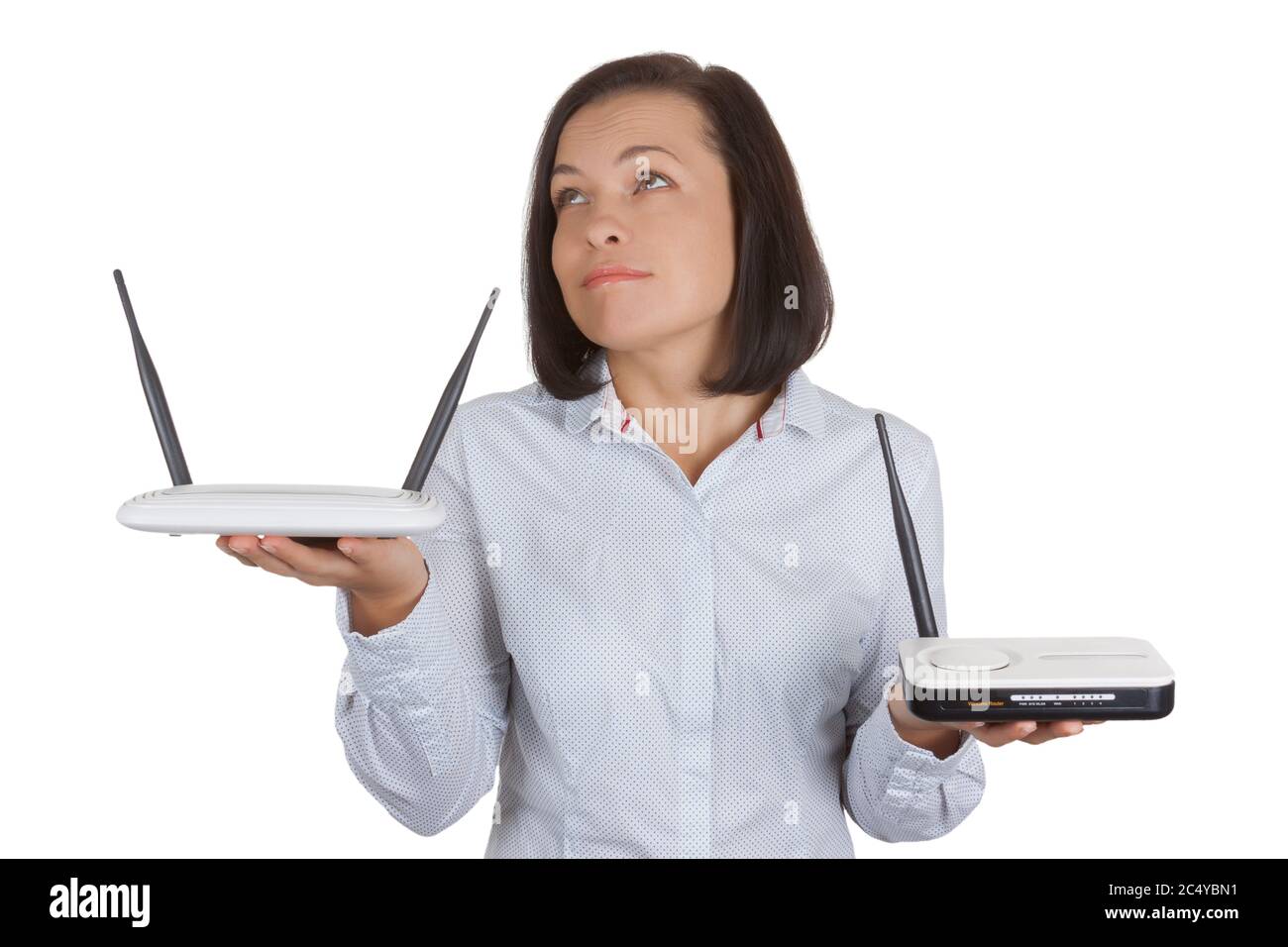 Beautiful Young Woman Choosing Between Two Wireless Modem Routers ...