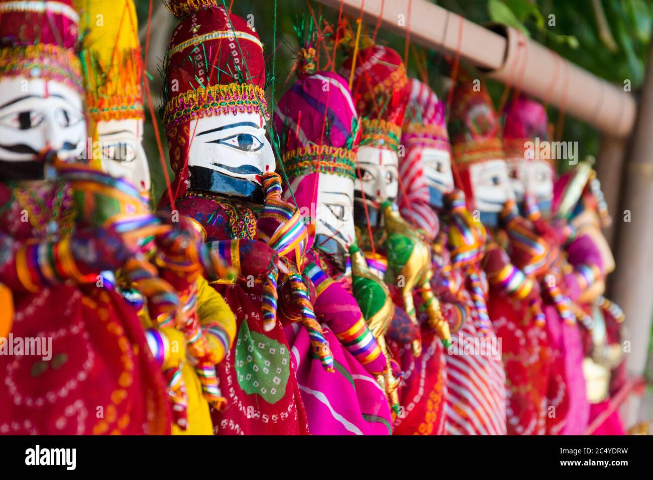 Selective focus on colourful puppets of kings and queens in Rajasthan, India Stock Photo