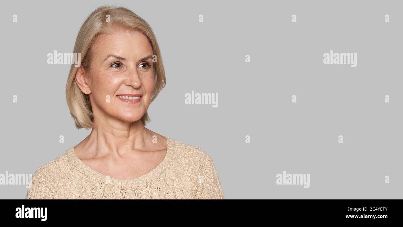 Elegant older woman smiling hi-res stock photography and images - Alamy