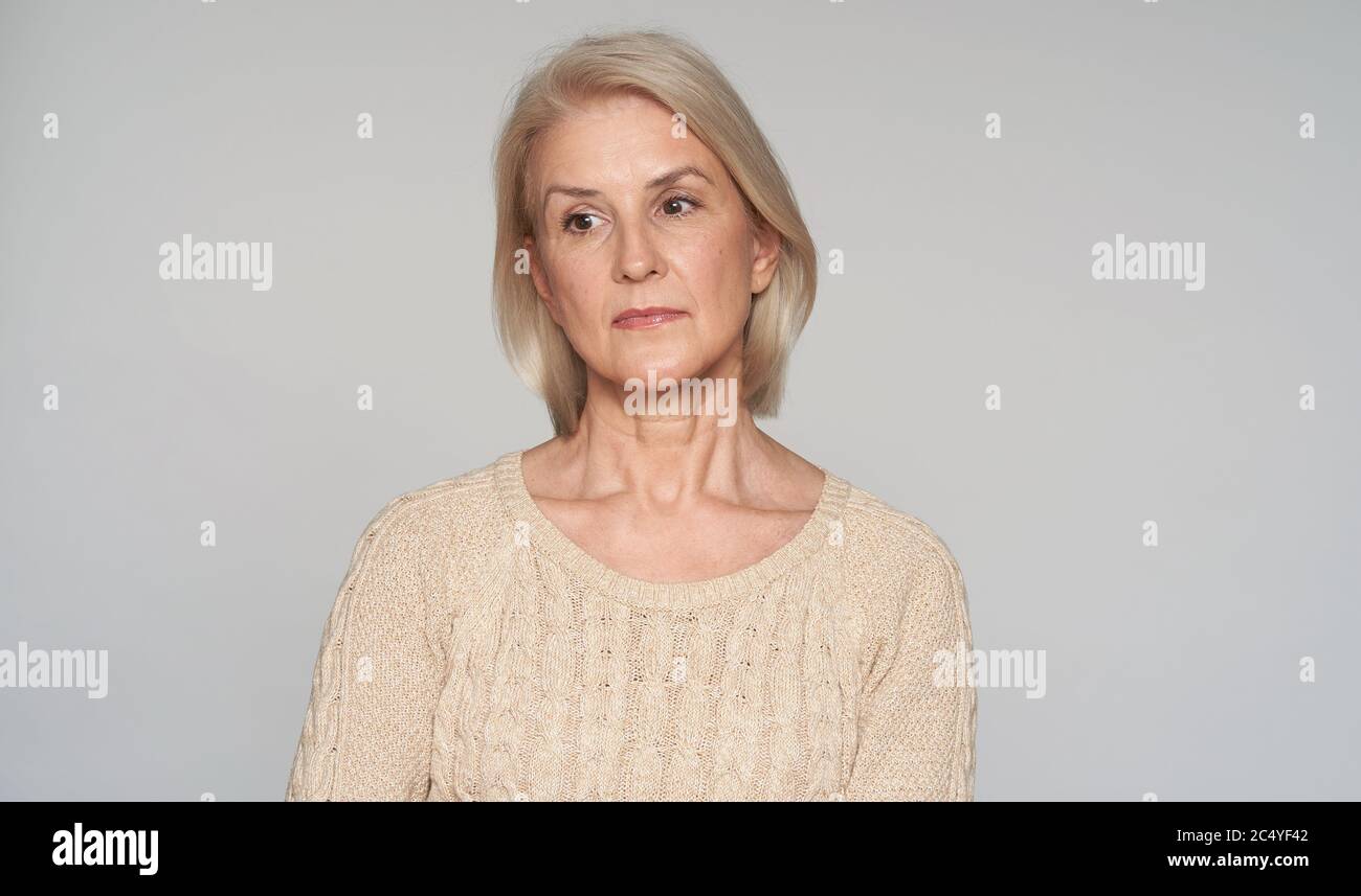 Elderly woman grey hair sad hi-res stock photography and images - Alamy