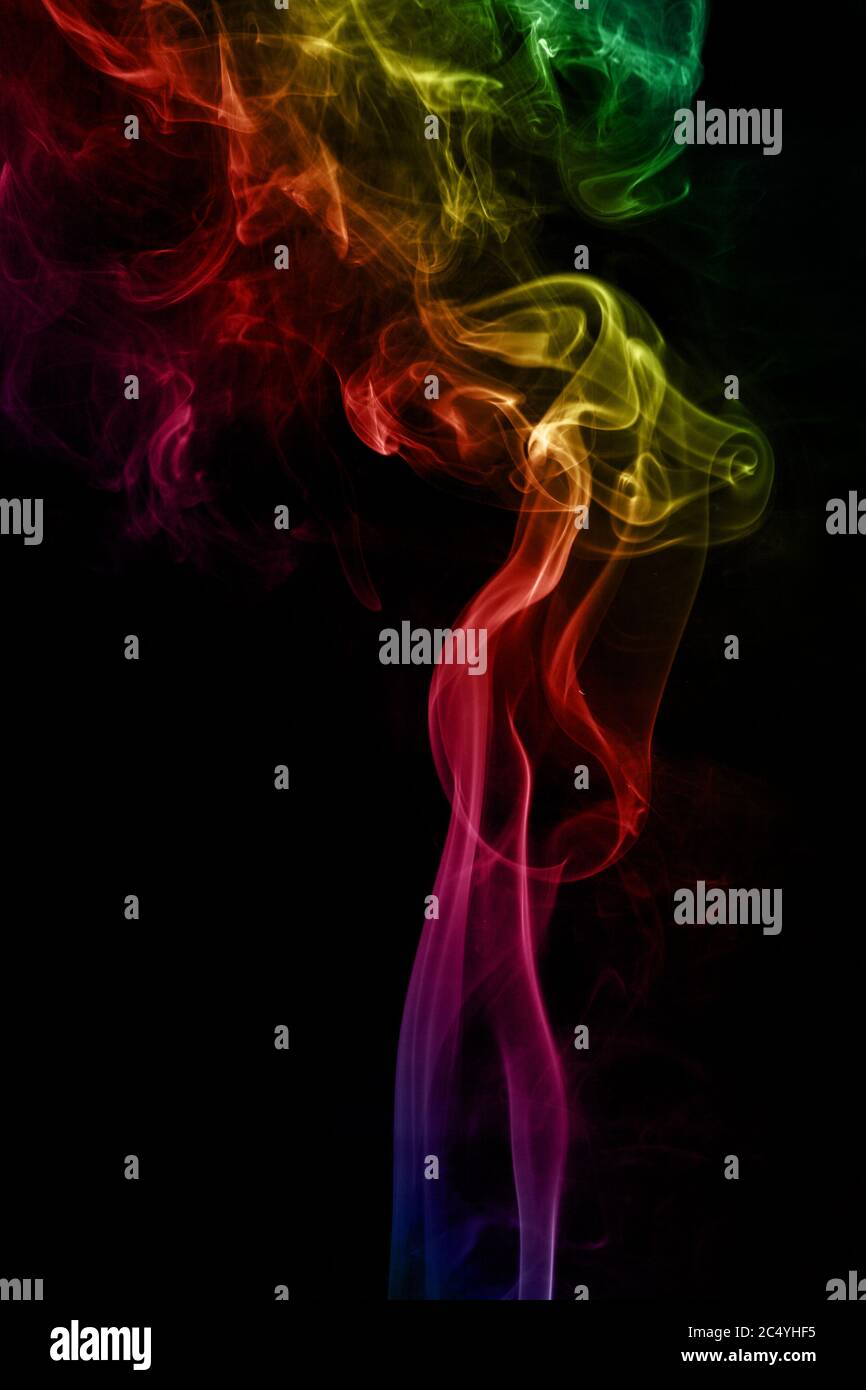 Abstract Art Colorful Smoke on a black background Stock Photo - Alamy