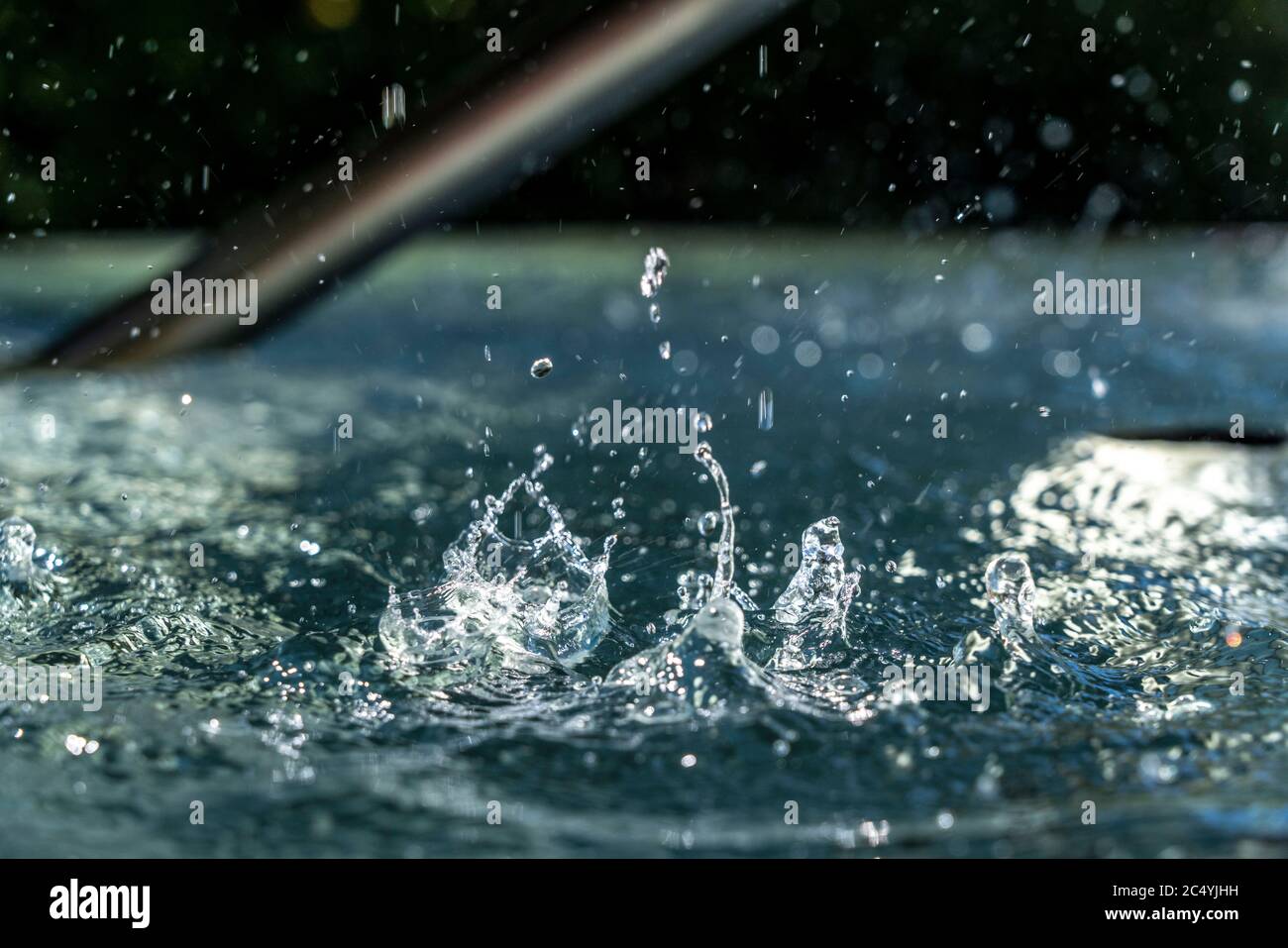 Drops of water, hitting the water surface Stock Photo Alamy