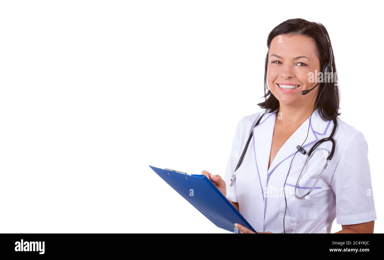 Medical Woman Doctor in Headset with Stethoscope Holding Clipboard with Copyspace for Yours Design on a white background Stock Photo