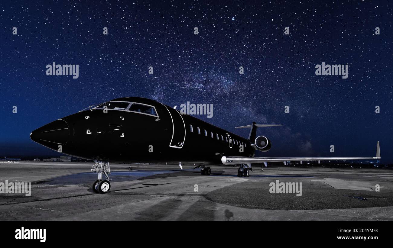 Business jet. black plane is parked. Private jet in the Parking lot Stock Photo