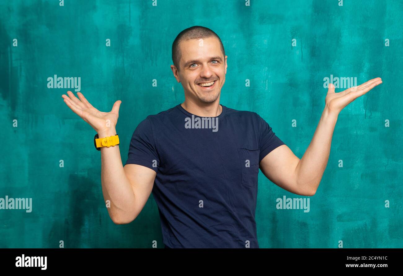 Man in dark blue shirt hi-res stock photography and images - Alamy