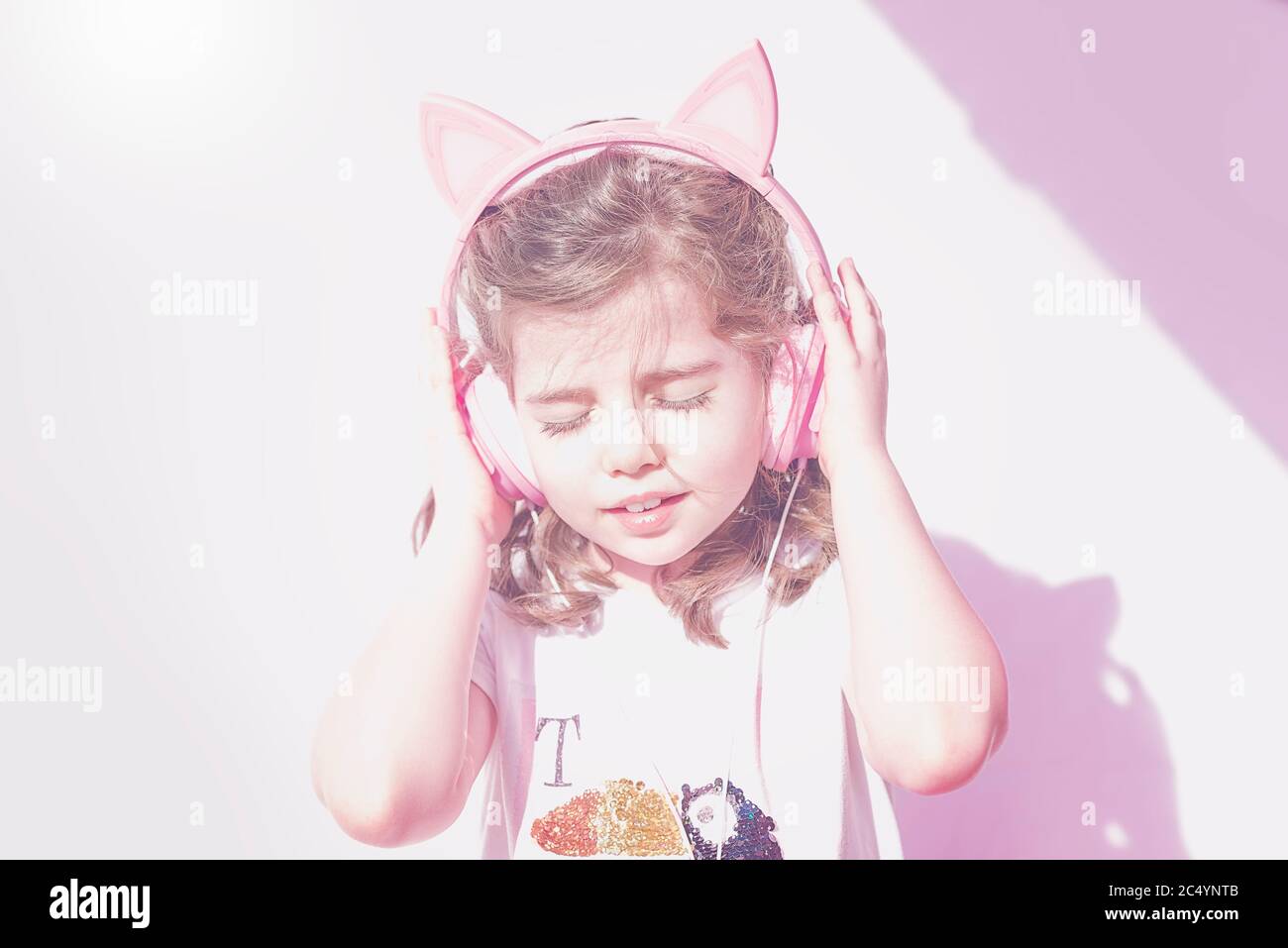 girl listening to music with her headphones Stock Photo