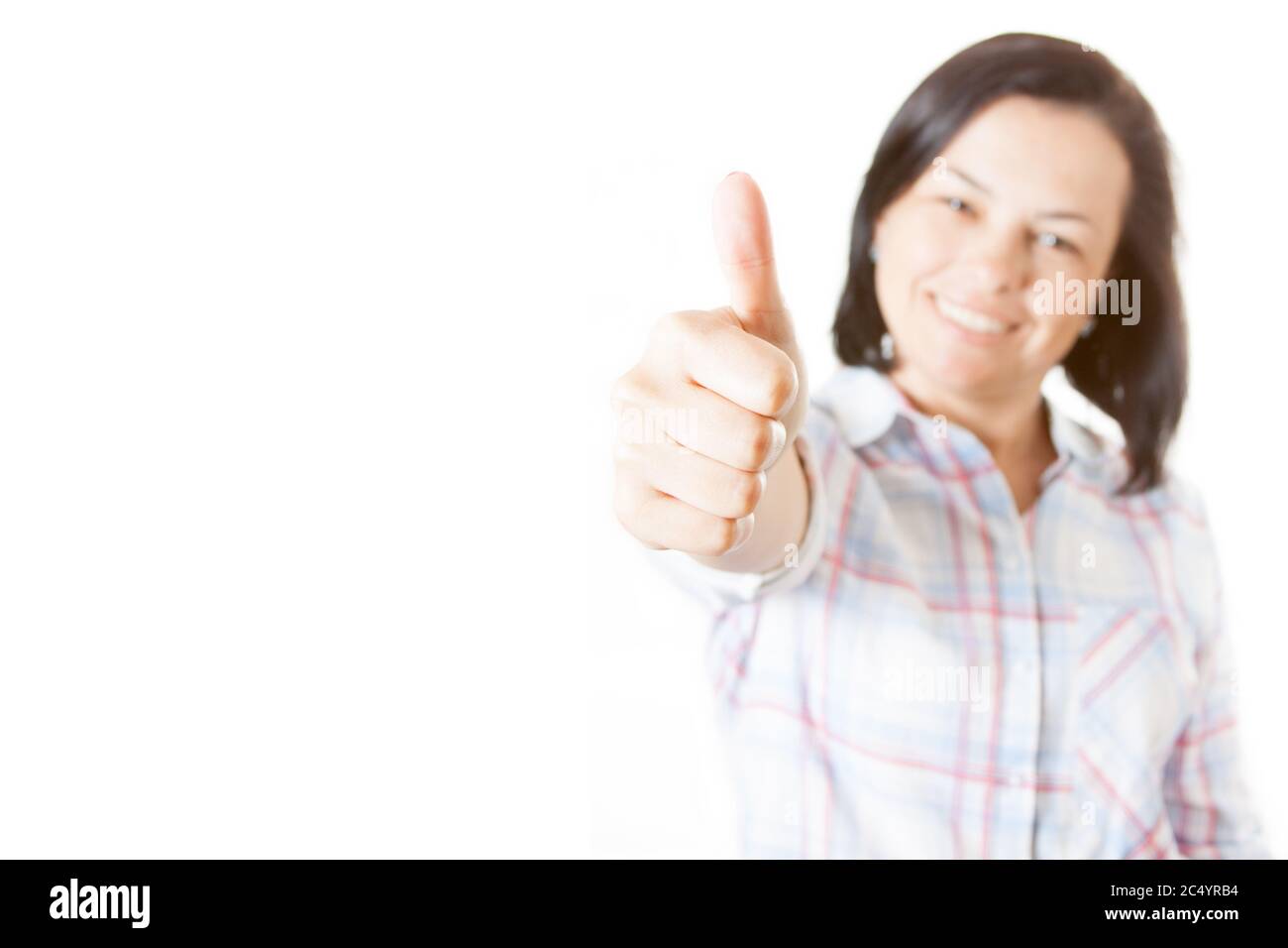 Happy Smiling Beautiful Young Woman Showing Thumb Up on a white ...