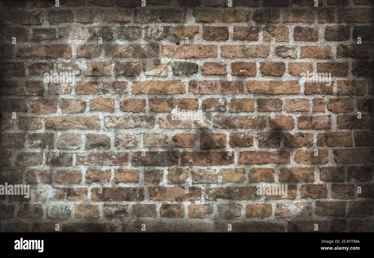 Aged and weathered old brick wall texture in a vintage retro design ...