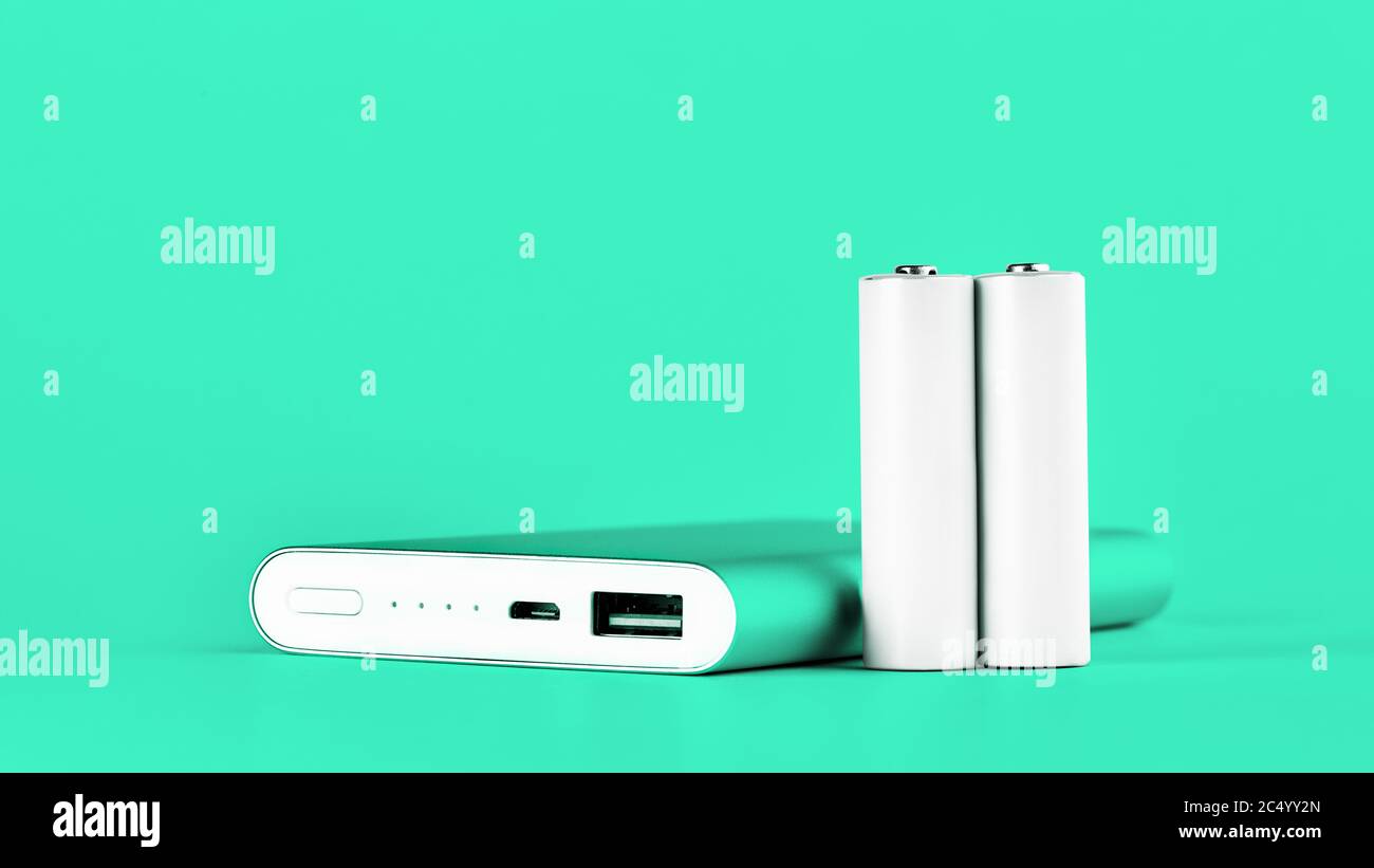 Portable green power bank for charging mobile devices and AA batteries