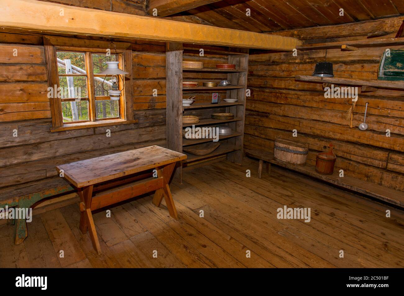 Interior of a Sami log building at the open-air section of Siida Museum in Inari, which is the national museum of the Sami People in Lapland, northern Stock Photo