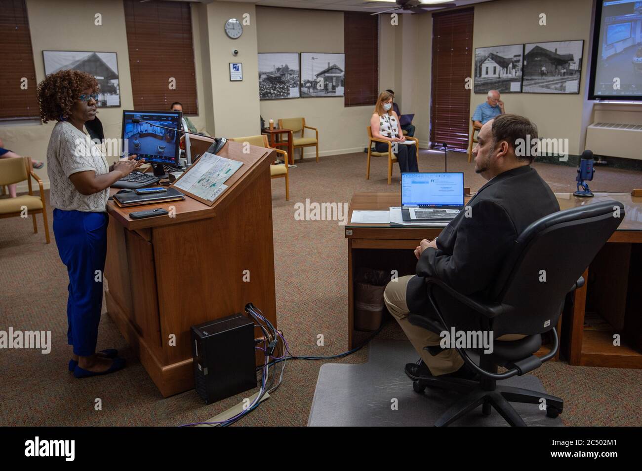 Manhattan, Kansas, USA. 29th June, 2020. TERESA RYNAI PARKS, left, speaks to the Riley County Commission on Monday. PARKS, and other community members addressed the commission regarding community masking and racial tensions within the county. Credit: Luke Townsend/ZUMA Wire/Alamy Live News Stock Photo