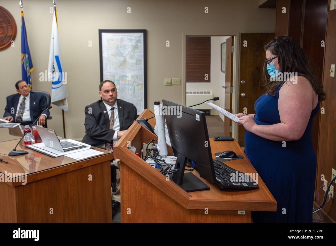Manhattan, Kansas, USA. 29th June, 2020. KAYLEE PROCTOR, right, speaks to the Riley County Commission on Monday. PROCTOR, and other community members addressed the commission regarding community masking and racial tensions within the county. Credit: Luke Townsend/ZUMA Wire/Alamy Live News Stock Photo