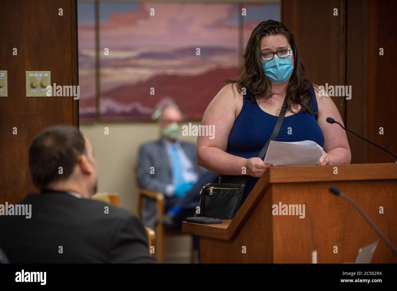 Manhattan, Kansas, USA. 29th June, 2020. KAYLEE PROCTOR, right, speaks to the Riley County Commission on Monday. PROCTOR, and other community members addressed the commission regarding community masking and racial tensions within the county. Credit: Luke Townsend/ZUMA Wire/Alamy Live News Stock Photo