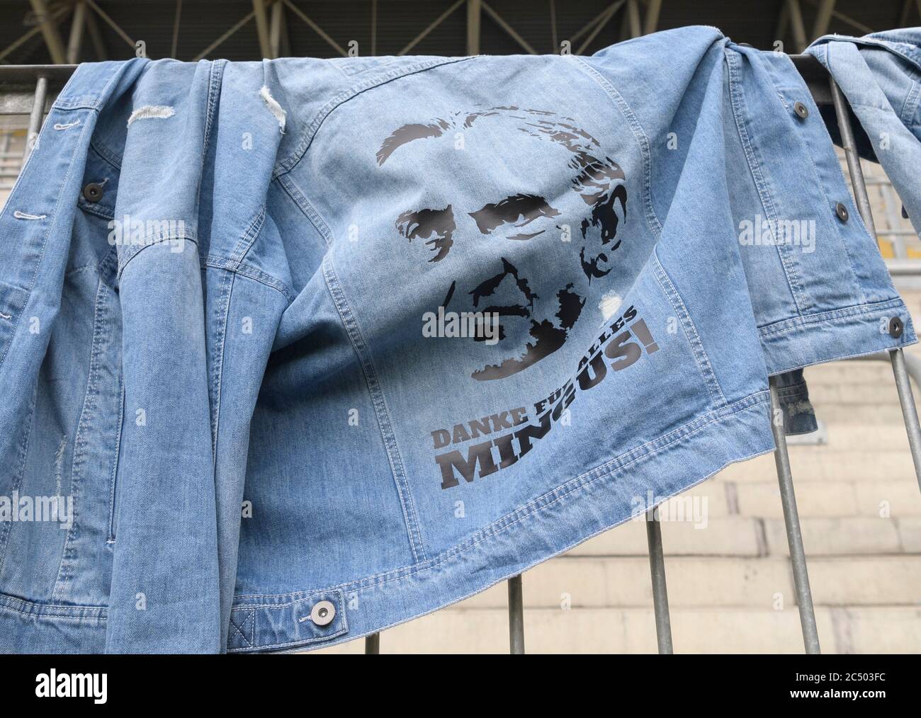 Dresden, Germany. 28th June, 2020. Football: 2nd Bundesliga, SG Dynamo  Dresden - VfL Osnabrück, 34th matchday, at the Rudolf Harbig Stadium. Jeans  jackets with the picture of the outgoing sports manager Ralf