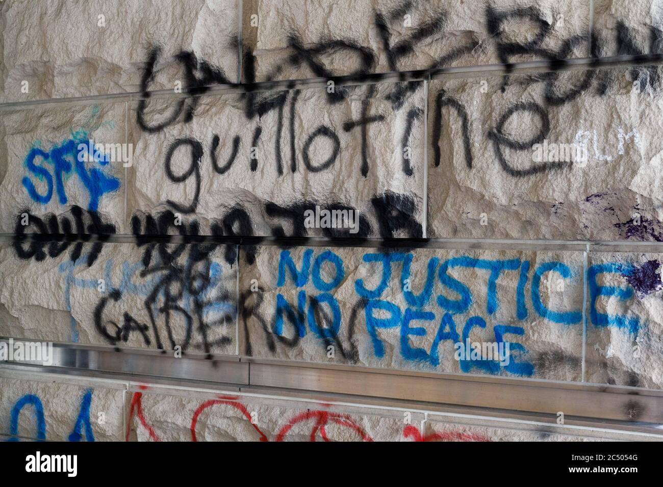 After 32 consecutive days and nights of protests, Portland, Oregon's Hatfield Federal Courthouse on June 28, 2020 shows dense graffiti. The Courthouse is next to Portland's Justice Center, the focus of police protests. (Photo by John Rudoff/Sipa USA) Credit: Sipa USA/Alamy Live News Stock Photo