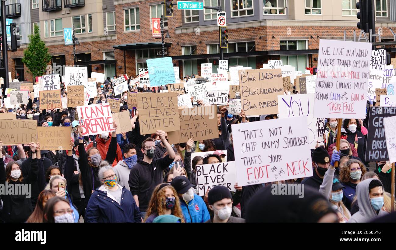 Auburn, WA/USA – June 2: Street View Protesters Gather holding up signs while Police keep watch at City Hall to March for George Floyd Auburn on June Stock Photo