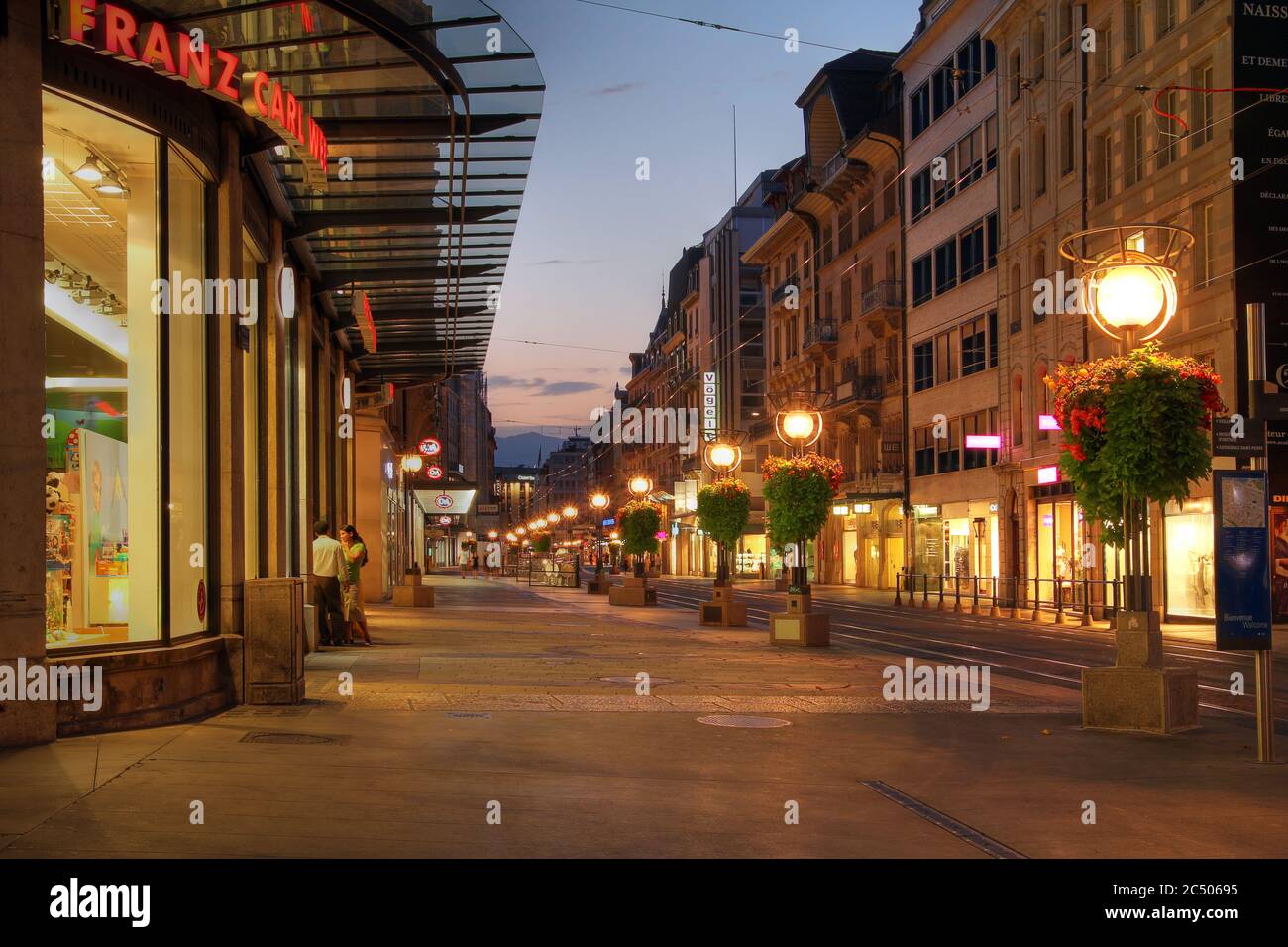 Geneva, Switzerland - August 21, 2011 - Night scene along the Rue de la Croix d'Or, a central avenue in downtown Geneva, a major city in the french-sp Stock Photo