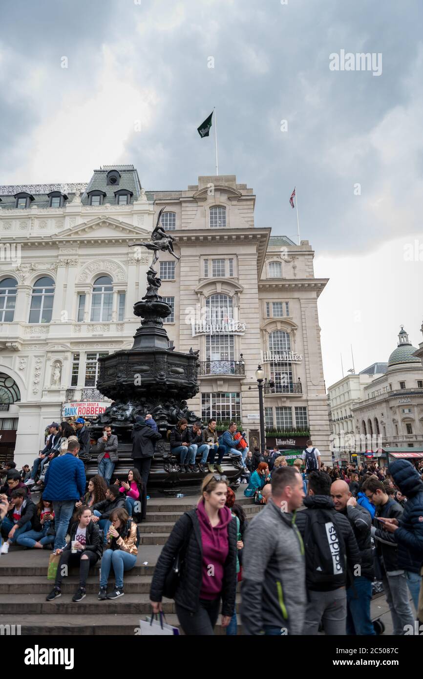 The Shaftesbury Memorial fountain crowded with tourists in London Piccadilly Circus. Stock Photo